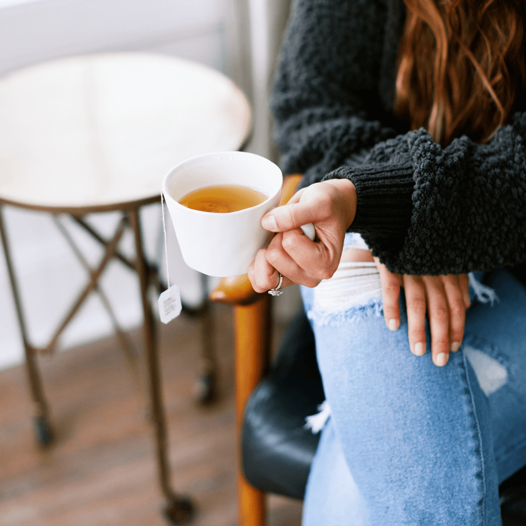 Woman drinking tea taking a Micro-Moment, a Different Approach to Stress Management